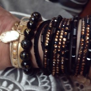 Sexy in black leather , black/ brown rhinestone on each leather strand bracelet